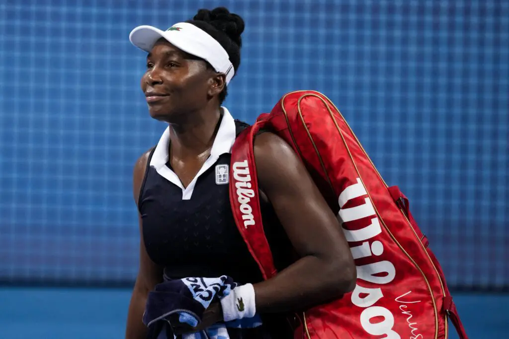 Venus Williams and Serena Williams, not pictured, of the United States walk off the court after their doubles match against Peyton Stearns of the United States and Marta Kostyuk of Ukraine during the Cincinnati Open.