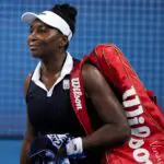 Venus Williams and Serena Williams, not pictured, of the United States walk off the court after their doubles match against Peyton Stearns of the United States and Marta Kostyuk of Ukraine during the Cincinnati Open.