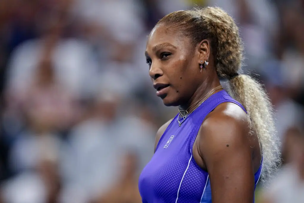 Serena Williams of the United States stands on the court against Marta Kostyuk of Ukraine and Peyton Stearns of the United States in their doubles match during the Cincinnati Open at Lindner Family Tennis Center.