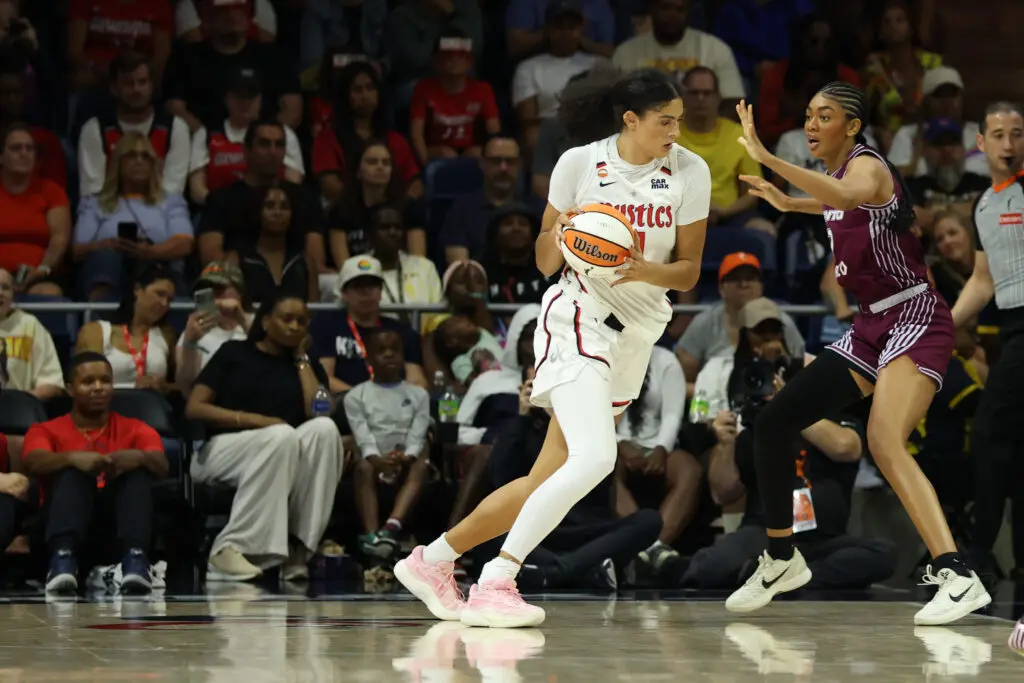 Washington Mystics center Lauren Betts (51) drives to the basket as Toronto Tempo forward Teonni Key (7) defends in the first half at CareFirst Arena.