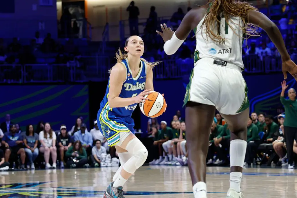 Dallas Wings guard Paige Bueckers (5) shoots against Seattle Storm center Awa Fam (11) during the first half at College Park Center.