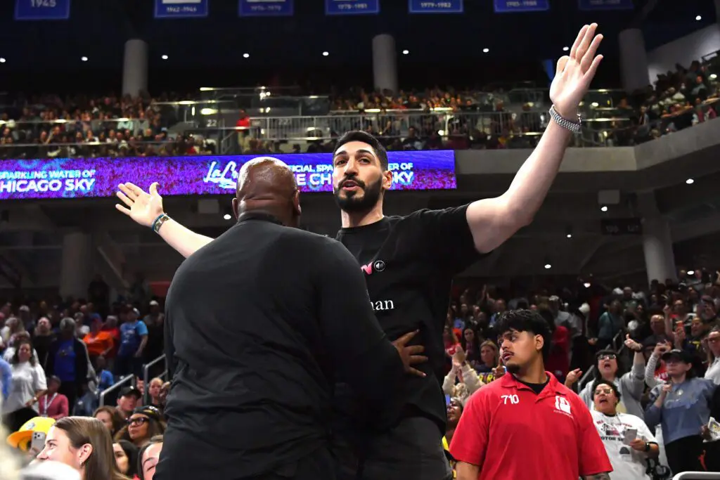 Turkish-American former basketball player and human rights activist Enes Kanter Freedom reacts as he is removed from the arena during the second half against the Indiana Fever at Wintrust Arena.