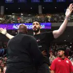 Turkish-American former basketball player and human rights activist Enes Kanter Freedom reacts as he is removed from the arena during the second half against the Indiana Fever at Wintrust Arena.