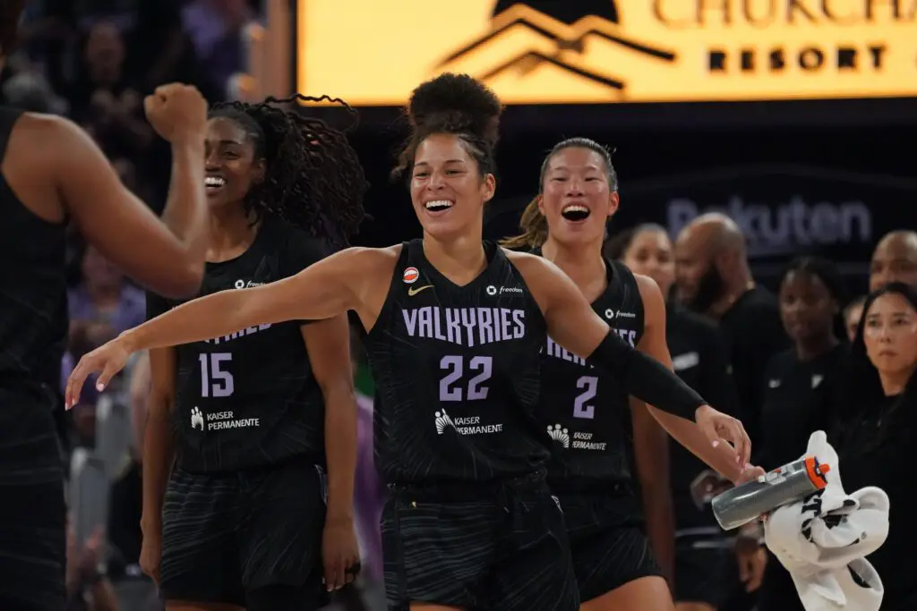 Golden State Valkyries guard Veronica Burton (22), guard Tiffany Hayes (15), and guard Kaitlyn Chen (2) congratulate their teammates during a game against the Dallas Wings in the second quarter at Chase Center.