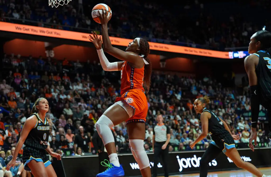 Connecticut Sun forward Aaliyah Edwards (8) drives the ball to the basket against the Chicago Sky in the second half at Mohegan Sun Arena.