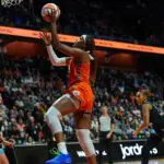 Connecticut Sun forward Aaliyah Edwards (8) drives the ball to the basket against the Chicago Sky in the second half at Mohegan Sun Arena.
