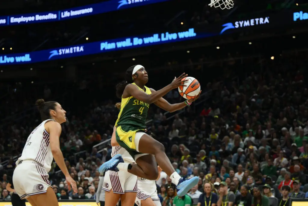 Seattle Storm guard Flau'jae Johnson (4) shoots a layup against the Toronto Tempo during the first half at Climate Pledge Arena.