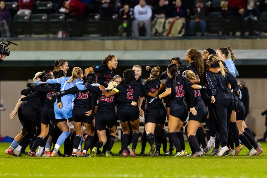 The Stanford Cardinal huddle before a second round soccer match of the NCAA tournament between the Alabama Crimson Tide and Stanford Cardinal.