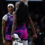Cotie McMahon #23 and Michaela Onyenwere #12 of the Washington Mystics celebrate after a play against the Dallas Wings during the second half of the game at CareFirst Arena on August 5, 2026 in Washington, DC.