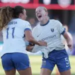 Maddie Dahlien #5 of Seattle Reign FC celebrates scoring her team's second goal with teammate Sofia Huerta #11 during the NWSL match between Bay FC and Seattle Reign at PayPal Park on August 01, 2026 in San Jose, California.