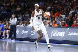 Rhyne Howard #10 of the Atlanta Dream sets up a shot during the third quarter against the Toronto Tempo at Gateway Center Arena on August 10, 2026 in College Park, Georgia.