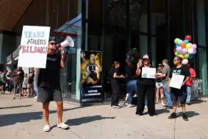 Demonstrators protest prior to the start of a WNBA game between the Indiana Fever and Minnesota Lynx at Target Center on August 02, 2026 in Minneapolis, Minnesota. Sophie Cunningham of the Indiana Fever has recently said she opposed transgender athletes participating in women’s sports.The Lynx defeated the Fever 108-100.