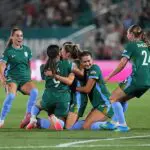 Janine Sonis #6 of Denver Summit FC celebrates with teammates after scoring the team's second goal during the NWSL match between Denver Summit FC and Utah Royals.