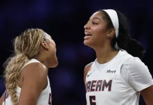 Angel Reese #5 of the Atlanta Dream celebrate her three pointer with Naz Hillmon #00 during the first half against the Los Angeles Sparks at Crypto.com Arena.