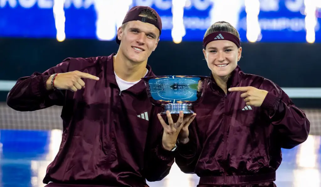 Jakub Mensik of the Czech Republic and Karolina Muchova of the Czech Republic pose with the champions trophy after defeating Belinda Bencic of Switzerland and Flavio Cobolli of Italy in the Mixed Doubles final of the US Open at USTA Billie Jean King National Tennis Center on August 26, 2026 in New York City.