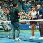 Alexandra Eala's father, Michael Eala, and Alexandra Eala with Iva Jovic and Iva Jovic's father, Bojan Jovic, on court during a Stars of the Open match against Alexandra Eala during Fan Week as part of the 2026 US Open at USTA Billie Jean King National Tennis Center on Thursday.