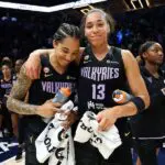 Gabby Williams #1 and Janelle Salaun #13 of the Golden State Valkyries celebrate the win against the Minnesota Lynx after the game at Target Center on August 24, 2026 in Minneapolis, Minnesota. The Valkyries defeated the Lynx 80-66.