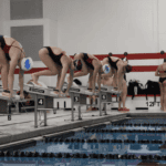 Hanover College women's swim team competes in a collegiate meet.