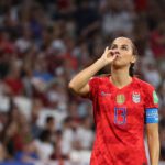 Alex Morgan celebrates goal against England in 2019 World Cup match.