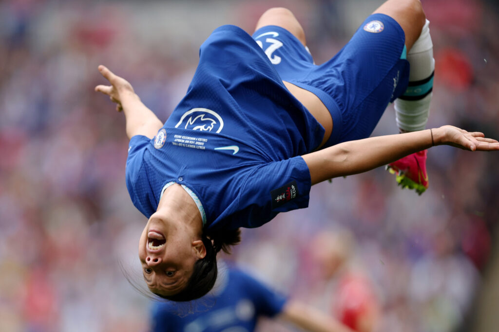 Sam Kerr celebrates a Chelsea win with a backflip