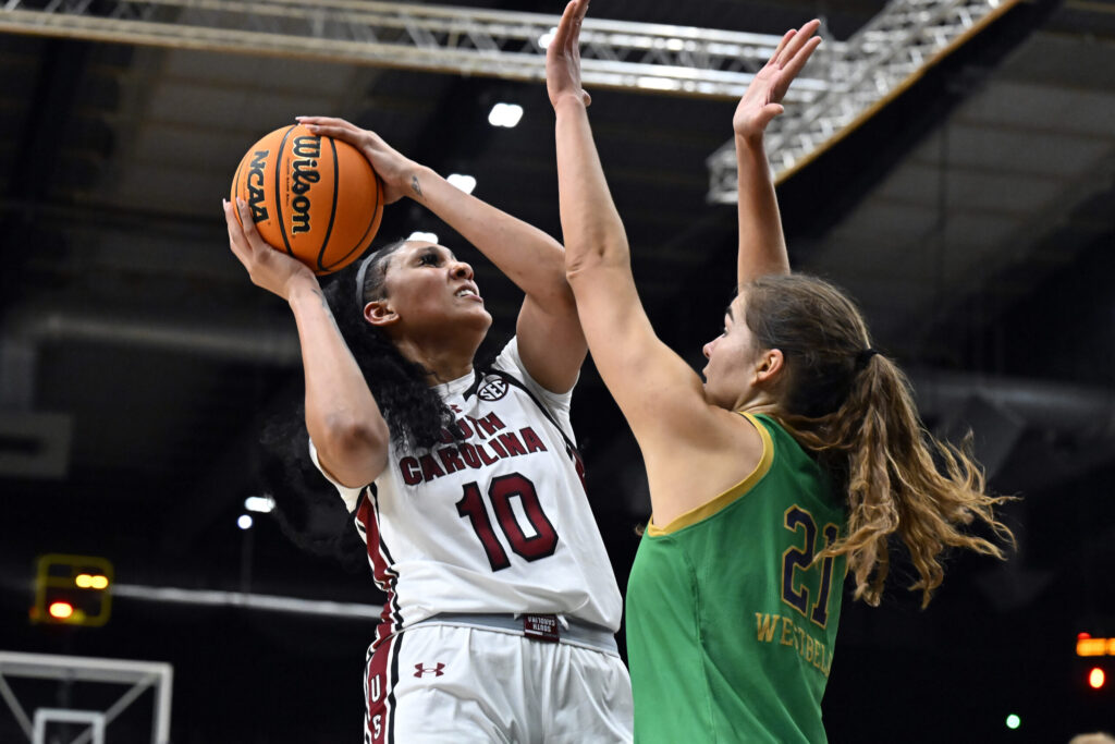 Kamilla Cardoso fights for possession with Maddy Westbeld during the Aflac Oui Play match between South Carolina and Notre Dame at Halle Georges Carpentier on November 06, 2023 in Paris, France. (Aurelien Meunier/Getty Images)