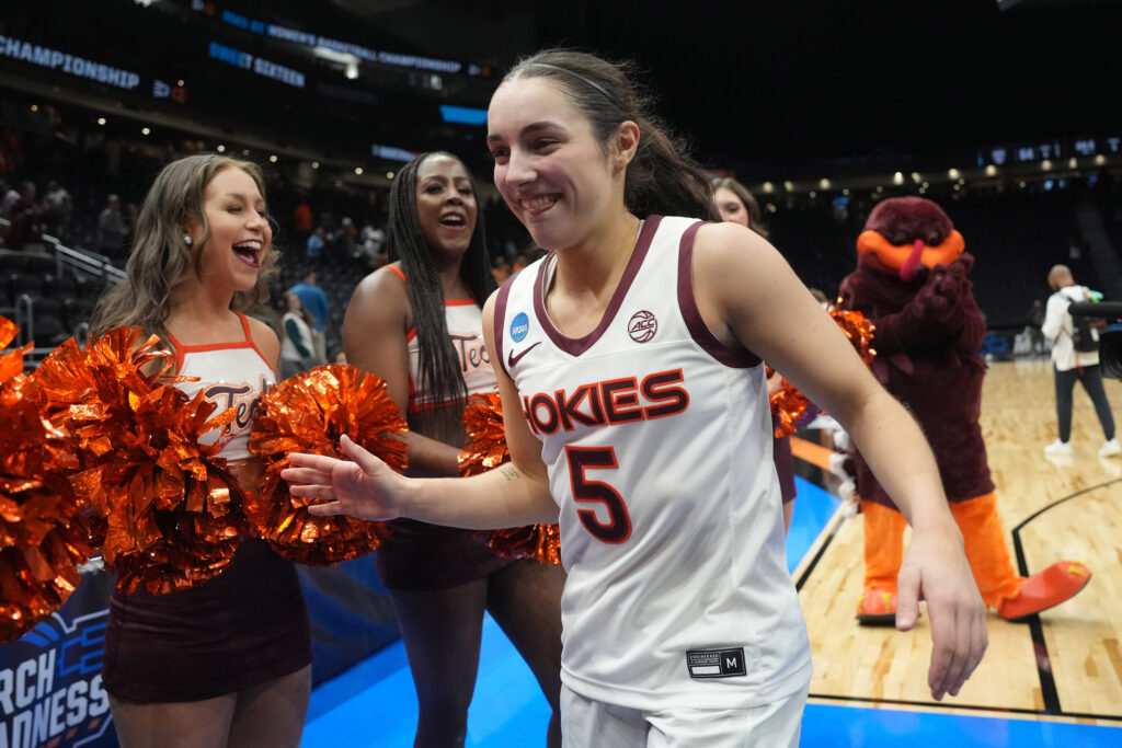Virginia Tech guard Georgia Amoore celebrates after the Hokies defeated Tennessee in the Sweet 16 of the 2023 NCAA women's basketball tournament