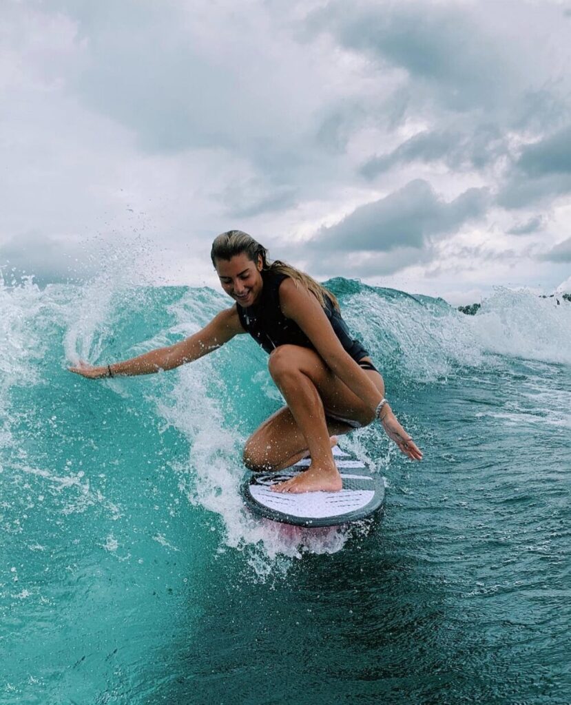 Woman surfing/ JWS