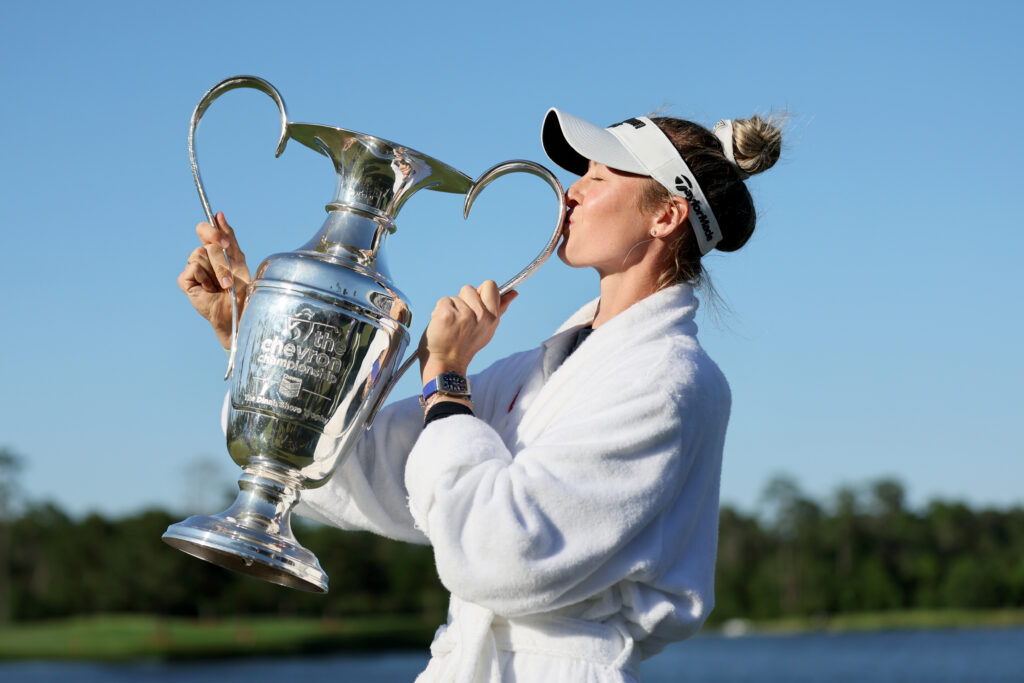 Nelly Korda of the United States celebrates with the trophy after winning The Chevron Championship