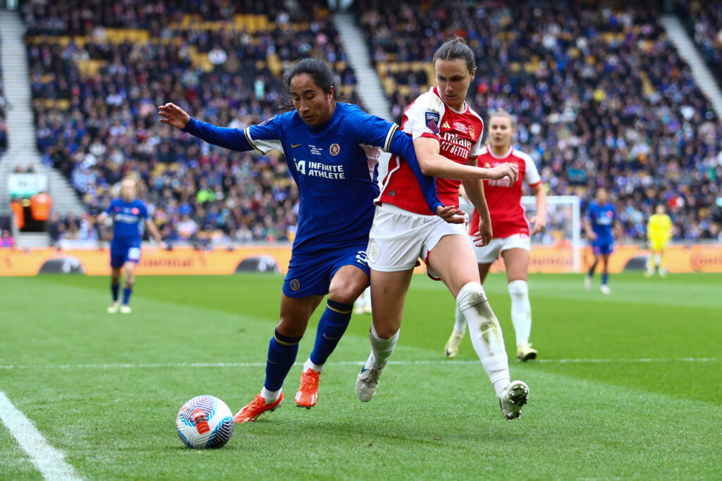 Mayra Ramirez of Chelsea battles with Lotte Wubben-Moy of Arsenal during the 2023/24 FA Women's Continental Tyres League Cup Final
