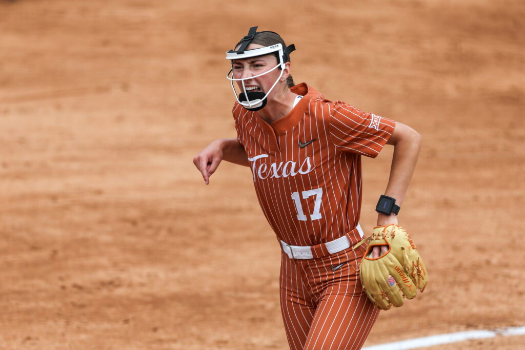 Texas pitcher Teagan Kavan (17) celebrates by screaming after closing out the second inning of the Big 12 college softball game