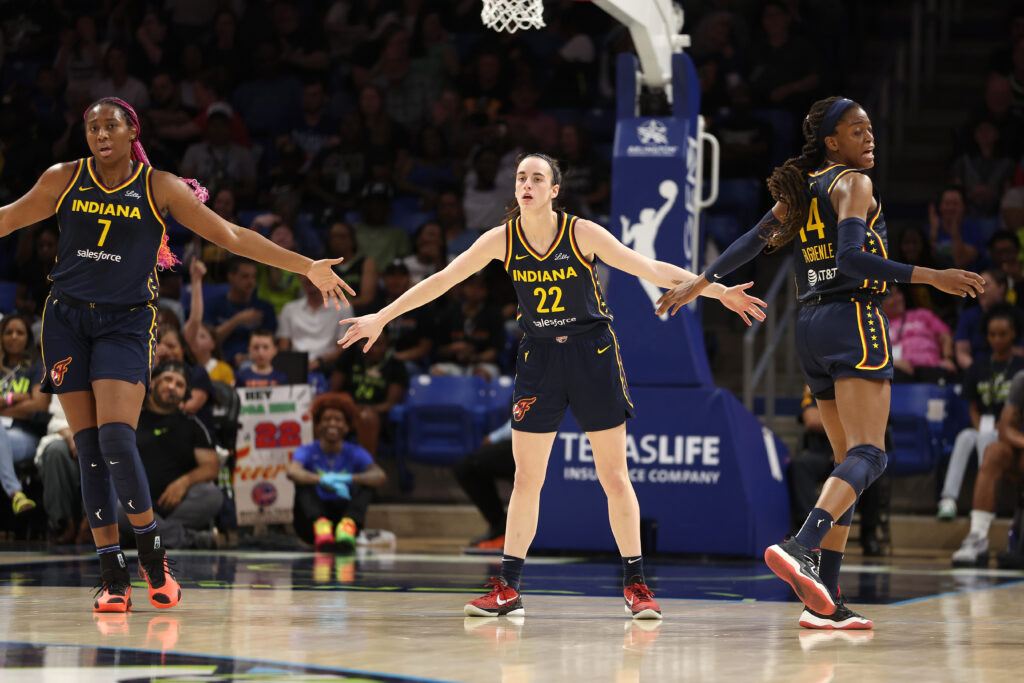 caitlin clark and aliyah boston on the court with the indiana fever