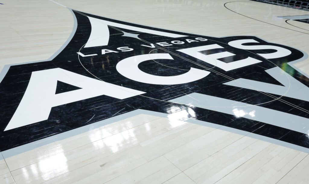 aces logo on basketball court