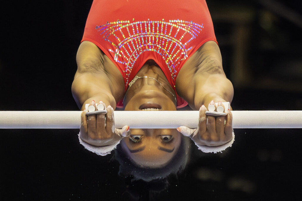 simone biles on the uneven bars for the us gymnastics olympic trials
