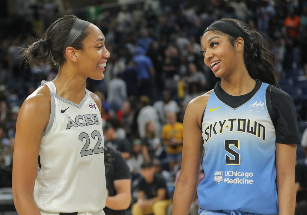 wnba stars a'ja wilson and angel reese chat after a aces-sky game
