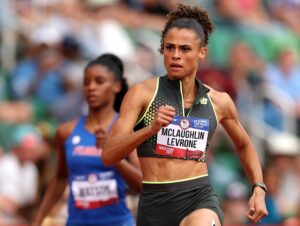 Track star Sydney McLaughlin-Levrone competes in the first round of the women's 400 meter hurdles at the 2024 US Olympic Team Track & Field Trials