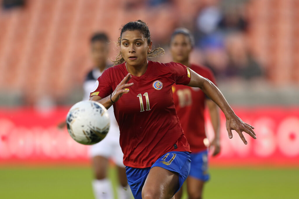 Costa Rica captain Raquel "Rocky" Rodriguez chases the ball during a match against Panama in 2020. 