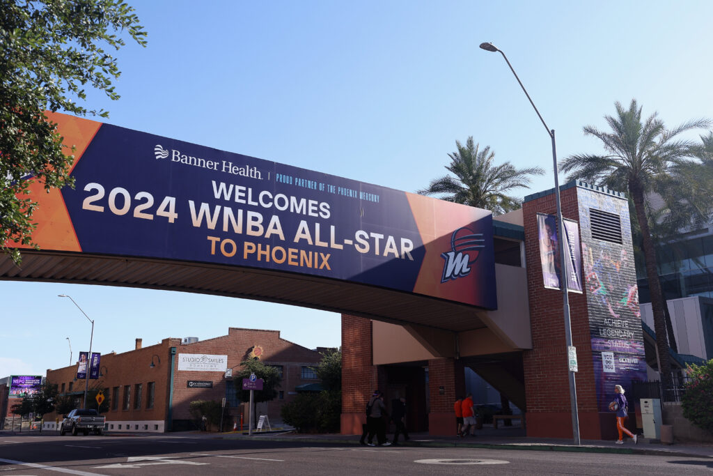 A 2024 WNBA All-Star banner hangs outside the Footprint Center