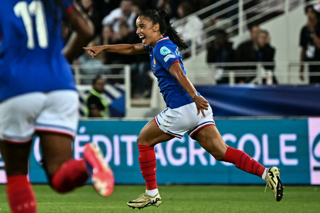 France defender Sakina Karchaoui celebrates her opening goal during Friday's 2-1 win over Sweden.