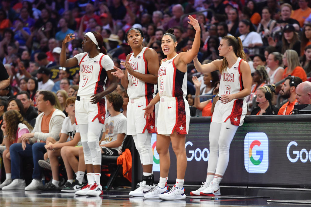 Team USA's Kahleah Copper, Alyssa Thomas, Kelsey Plum, and Sabrina Ionescu gear up to face Germany in pre-Olympic exhibition.