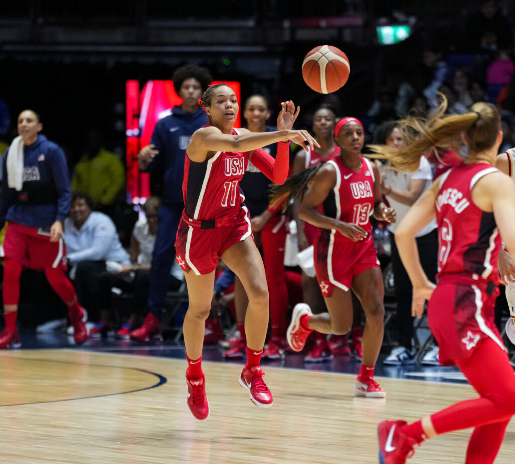 Napheesa Collier passes to teammate Sabrina Ionescu of Team USA