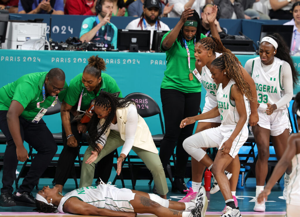 Nigerian basketball player Ezinne Kalu celebrates  on the court after beating Australia at the Olympics