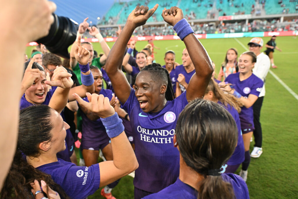 Orlando Pride forward Barbra Banda celebrates with teammates during an NWSL game