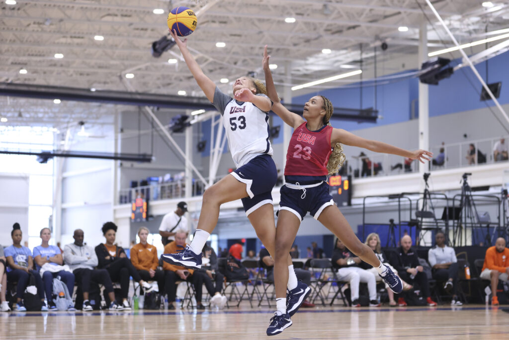 Jerzy Robinson shoots against Madison Francis at USA Basketball 3x3 team trials in 2023