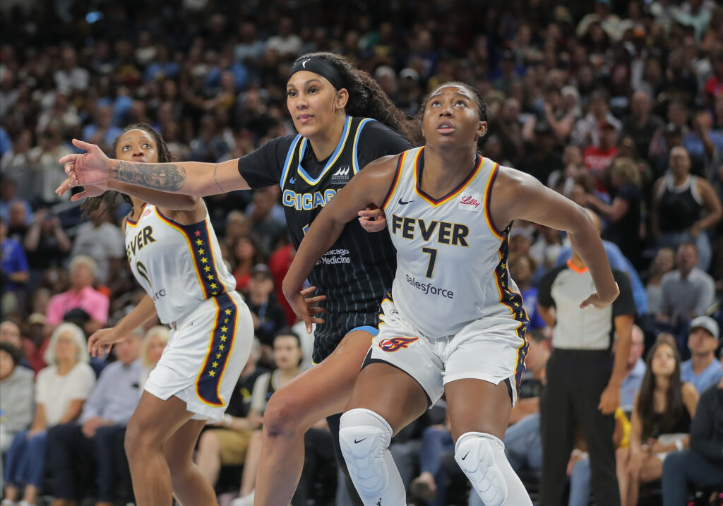 Indiana's Aliyah Boston boxes out Chicago's Kamilla Cardoso during a June WNBA game.