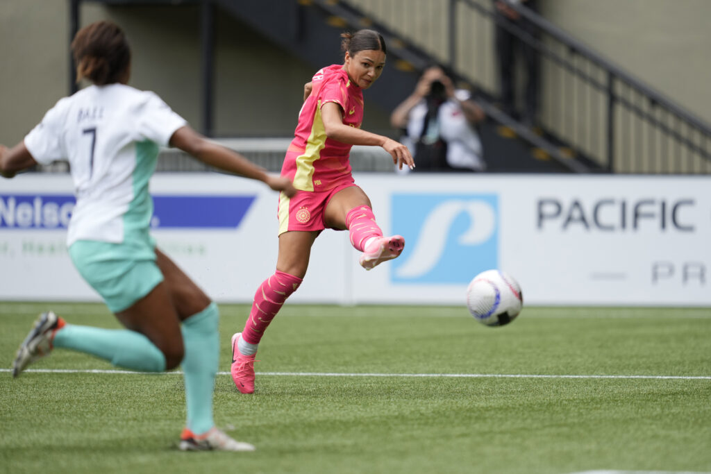 Portland's Sophia Smith takes a shot against Kansas City in a June 2024 match.