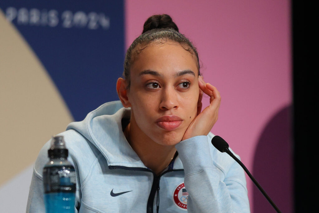 Team USA's 3x3 basketball bronze medalist Dearica Hamby sits in an Olympic press conference.