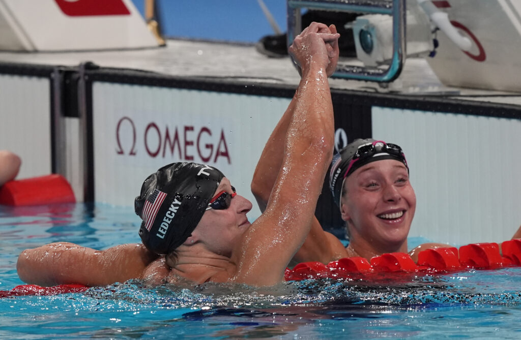 800-meter freestyle gold medalist Katie Ledecky in the pool with bronze medalist Paige Madden