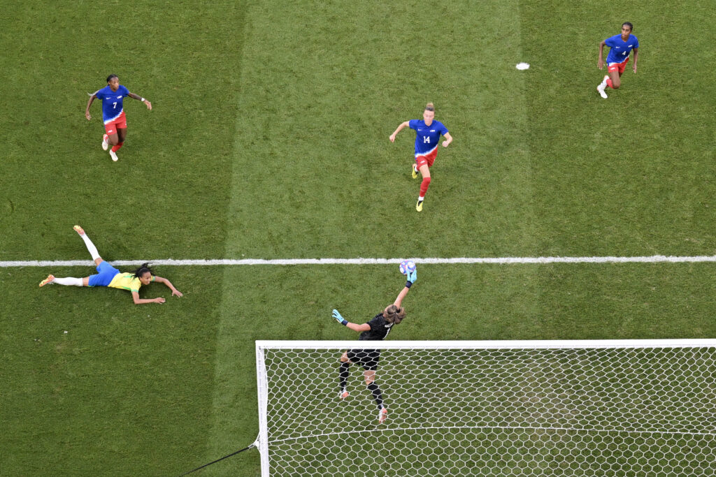 Goalkeeper Alyssa Naeher makes a brilliant save in the USWNT’s gold medal victory against Brazil.