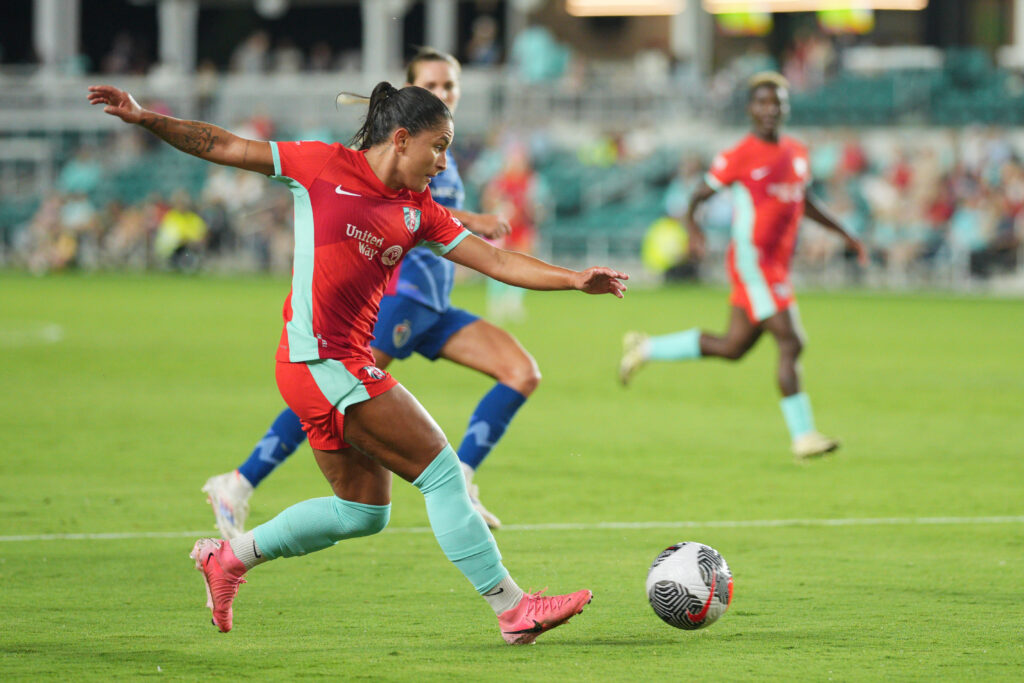 KC Current midfielder Debinha takes aim at the ball in their Summer Cup semifinal win over North Carolina.