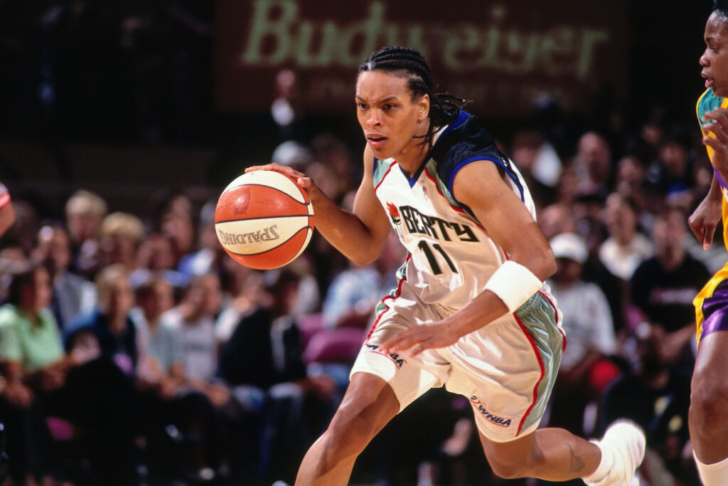 WNBA star Teresa Weatherspoon of the New York Liberty handles the ball against the Los Angeles Sparks on August 5, 1997 at Madison Square Garden